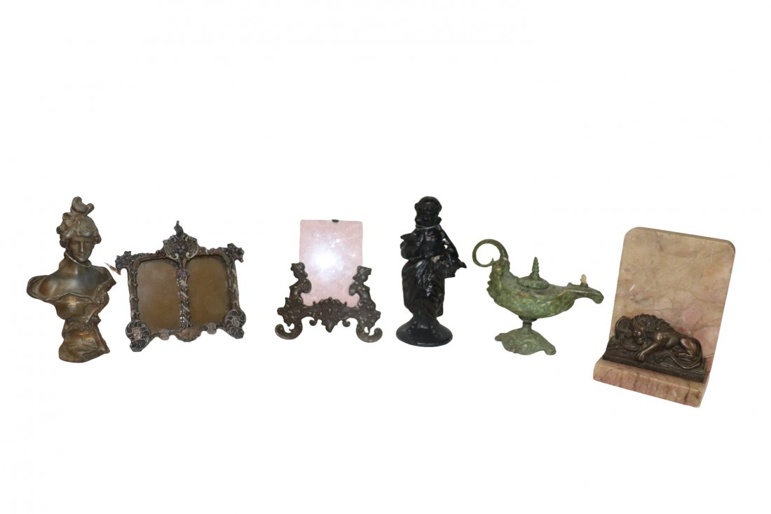 6 Assorted Metal Collectables: 6 piece collection of assorted metal pieces. Oil lamp, Picture frames, Figurines, and small statue. All 6 are in good condition. Please see detailed photos for more information on this offer.