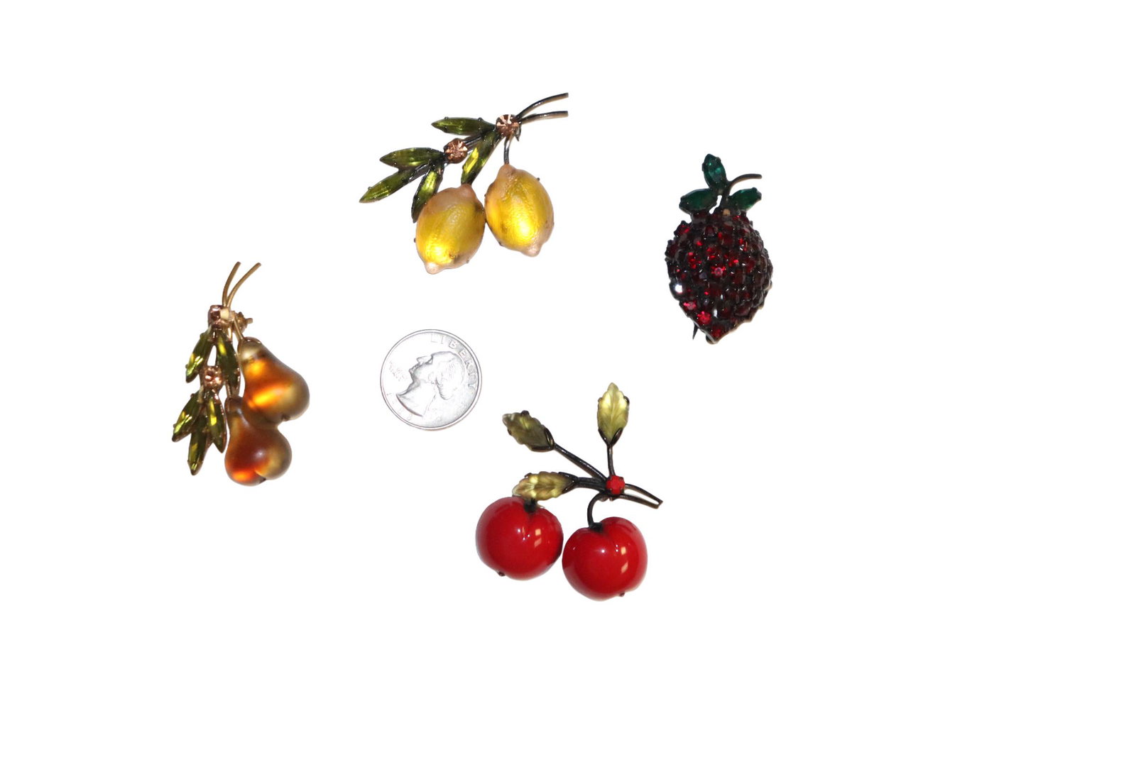 Vintage Colorful Fruit Themed Pins: 4 vintage fruit pins. Pears, cherries, grapes and lemons. Nice collection. Dimensions range 1-1/2 inches. Please review all photos posted for this listing. We encourage all bidders to request a condit