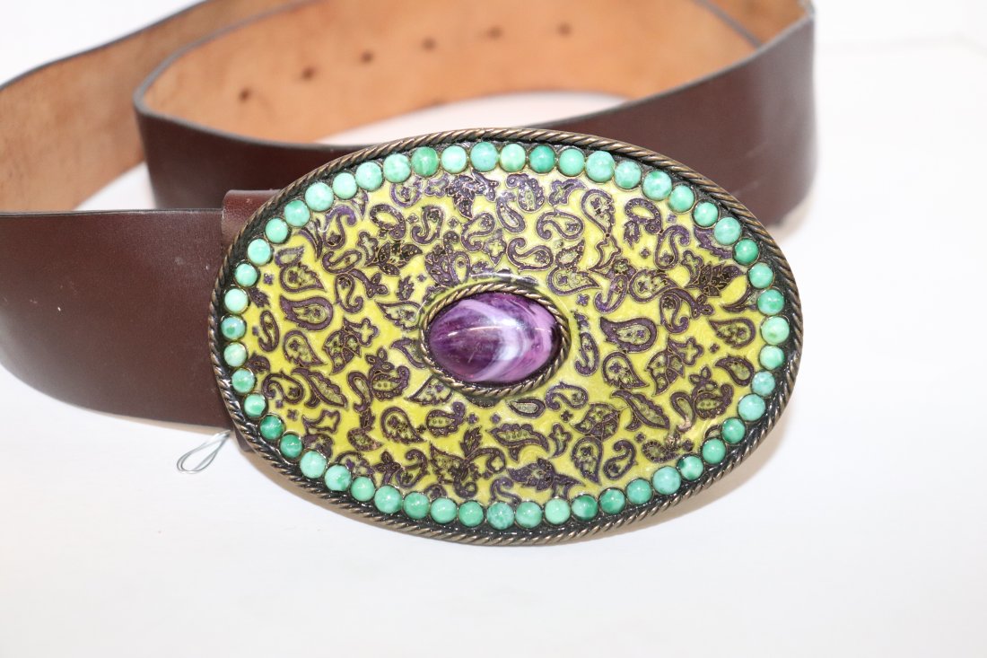 Etro Italian leather belt: Nice Etro Italian leather belt with large oval green and purple buckle. Buckle dimensions 5 inches x 3 inches. Belt 40 inches long x 2 inches wide. Please review all photos posted for this listing. We