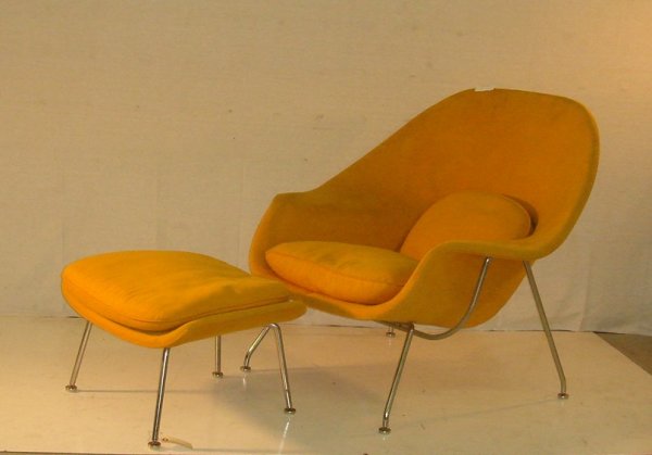 Eero Saarinen/Knoll Womb Chair: Eero Saarinin/Knoll "Womb" Chair upholstered in original orange fabric on chrome base (35"x 38") with ottoman (13"x24") Knoll Tag.