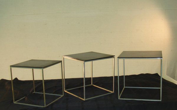 Poul Kjaerholm PK71 nesting tables: Set of three PK71 nesting tales by Poul Kjaerholm with square steel frames and black acrylic tops. Largest 11"