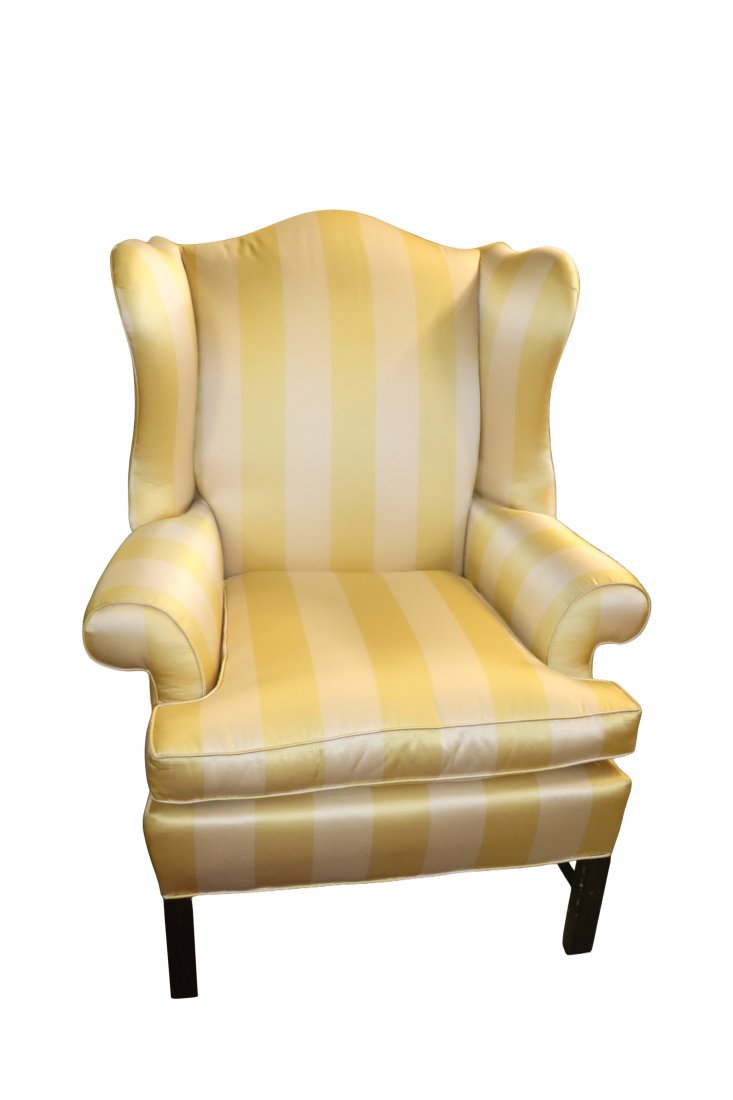 Wing Chair with Silk Yellow & Cream Fabric: Transitional Wing in Silk Yellow and Cream Striped upholstery. Dimensions: 42 inches high x 30 inches deep x 33 inches wide. Please refer to photos for more details. CONDITION Please inspect each lot 