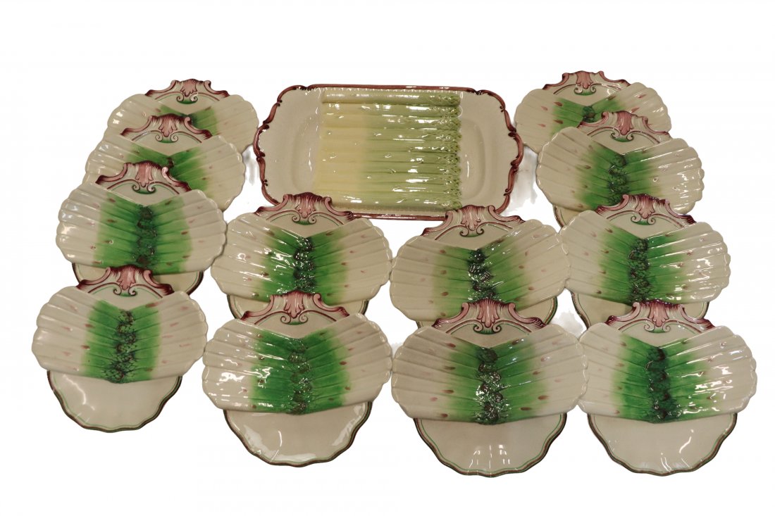 Sarreguemines Asparagus Plates and Platter: Set of 12 Asparagus Plates and Platter. Sarrguemines French Majolica Dimensions: Plates Measure 9 inches x 10 inches x 1 inch deep. Platter measure 10 inches x 16 inches x 2 1/2 inches deep. Please re