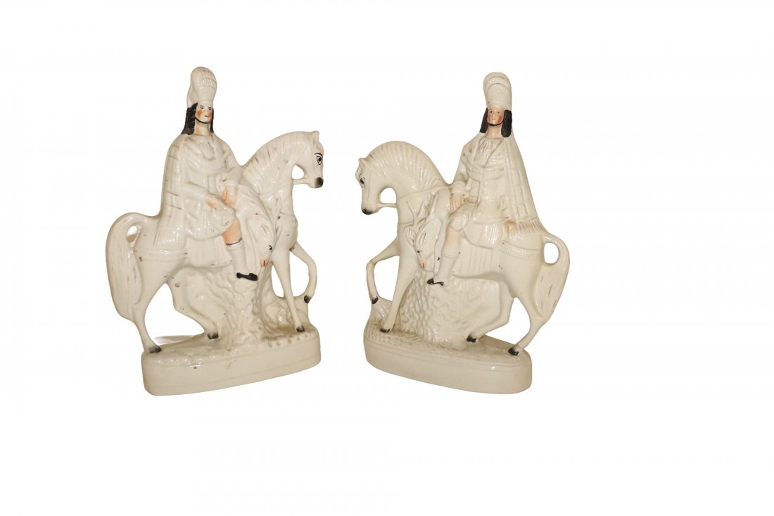 Set of Men on Horseback Staffordshire Porcelain: Set of Men on Horseback Staffordshire Porcelain Figurines kill draped over saddle, , Dimensions: 14 inches high x 8 1/2 inches wide x 2 inches deep Please refer to photos for more details. CONDITION P