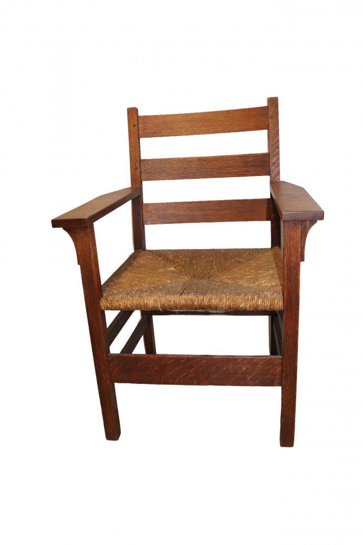 Gus Stickley Open Arm Rush Seat Chair.: Early Gus Stickley Open Arm Rush Seat Chair, signed Dimensions: 35 1/2 inches high x 24 1/2 inches wide 21 inches deep. Seat heigh 17 1/2 inches . Seat Depth 18 inches Please refer to photos for more 