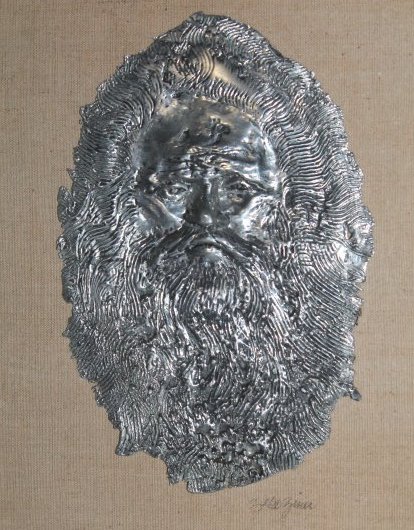 Signed Ziner Judaica Wall Sculpture: Signed Judaica Wall Sculpture of mans face framed and mounted on board . Signed on bottom right Zeke Ziner (Born 1919) is active lives in Connecticut. Zeke Ziner is known for Sculptor, painter, printm