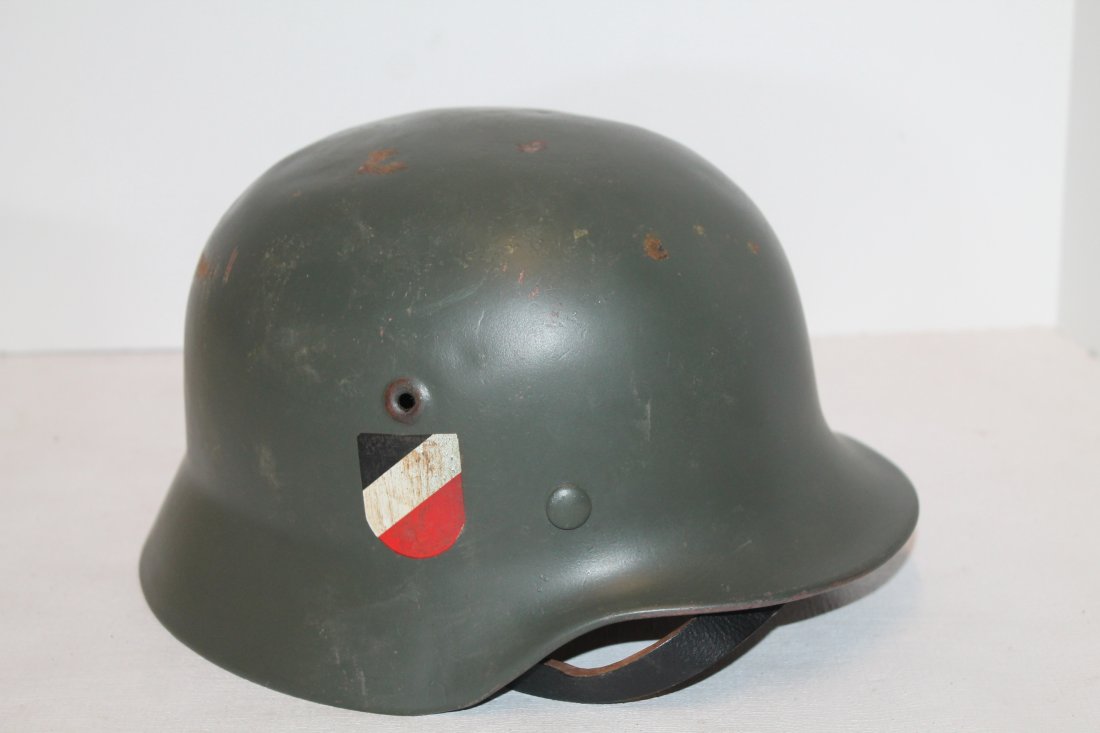 WWII Stahlhelm Nazi War Helmet: WWII Nazi War Helmet. The Stahlhelm ,steel helmet, is a German military steel helmet intended to provide protection against shrapnel and fragments of grenades. The term Stahlhelm refers both to a gene