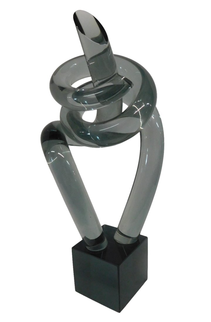 Elio Raffaeli Art Glass Knot Sculpture. Signed: Elio Raffaelli Signed Sculpture . Art Glass Knot on Smoky colored glass base. Signed on bottom of sculpture Dimensions: 21 inches high x 8 inches wide x 7 inches deep. Base measures 4.25 inches x 4.25