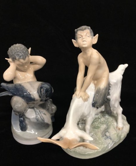 Royal Copenhagen Denmark Pan Faun Figurines: Royal Copenhagen Fan Faun Figurines . Stamped on Bottom Pan Faun with Satyr Goat & Pan Faun with Crow. Dimensions: Pan Faun With Goat 8.5 inches wide x 8.25 inches high x 3.5 inches deep. Pan Faun wit