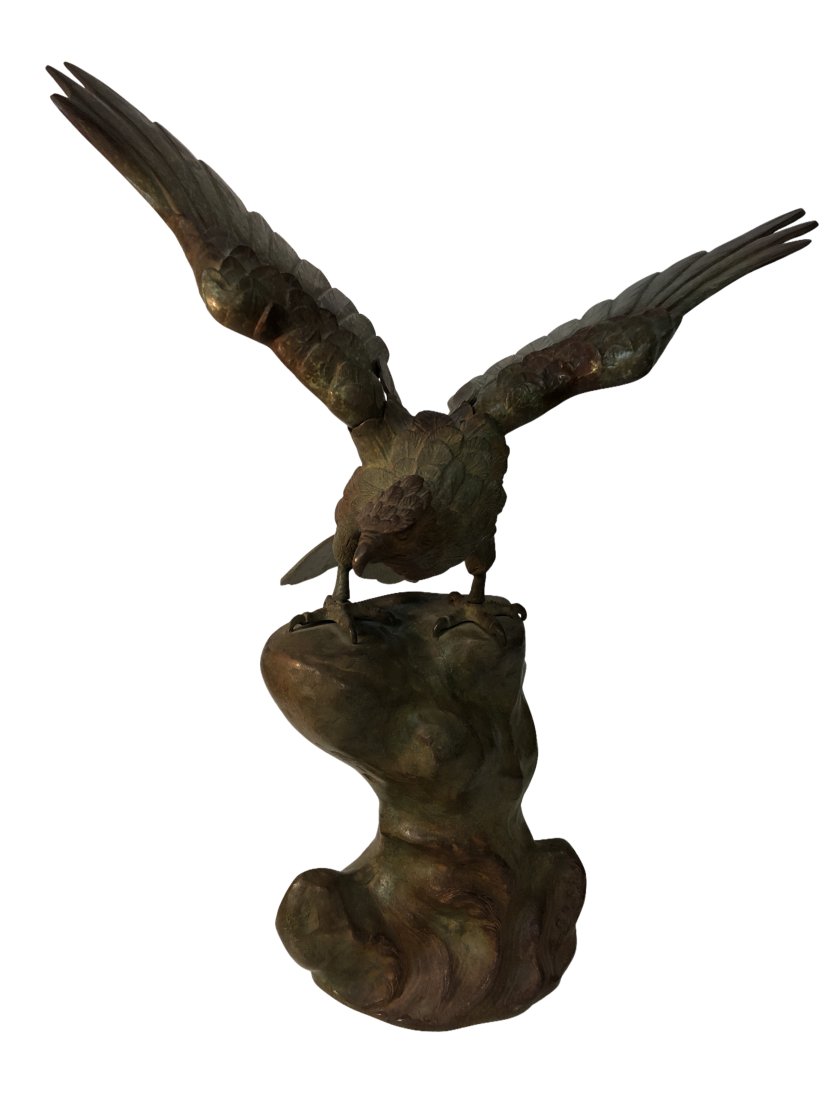 Japanese Meiji Style Cast Iron Hawk: Japanese Meiji Style Cast iron Hawk Sculpture with Removable wings. HAs stamp on back Dimensions: 21 inches high x 16.5 inches wide x 5 inches deep Condition : Expand photos to see additional details.