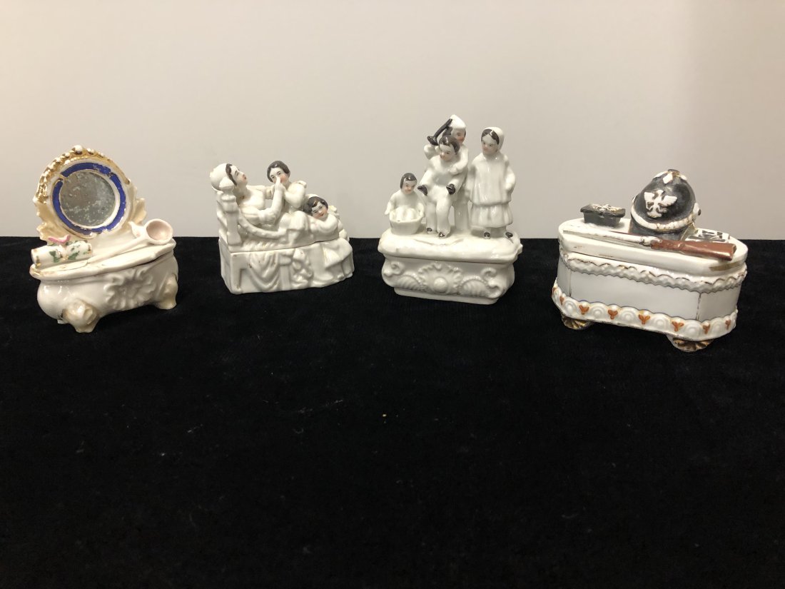 Antigue Fairing's Collection Trinket Boxes: Collection of 4 Antique Fairing's Trinket boxes. Mother & Her children, Mother & Father with their children, and Helmet & Rifle top of box. These fairing boxes were purchased all over the US and Engla