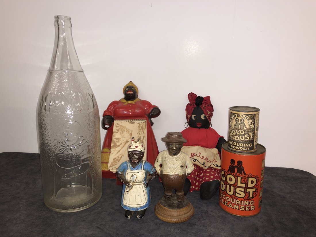 Collection Black Americana & Collectibles from 1930's: Vintage c 1930's Mammy Beverages Co. 60oz. Soda Bottle, Cast Iron Bank Man & Woman, Plastic Kitchen Note pad holder, Vintage black Cloth Doll and Gold Duct Scouring Cleansers tins sealed. This collect