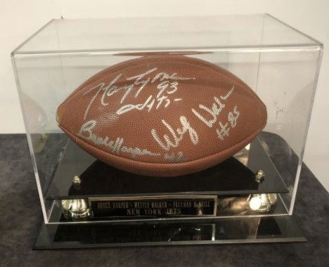 Vintage Autographed Football from Jets: Autographed Jets football. Autographed Bruce Harper 1977-1982 ALl time Jets Punt returner. West Walker wide receiver 1977-1982 & Freeman McNeill running back. Dimensions: 12 inches x 9 inches high x 8