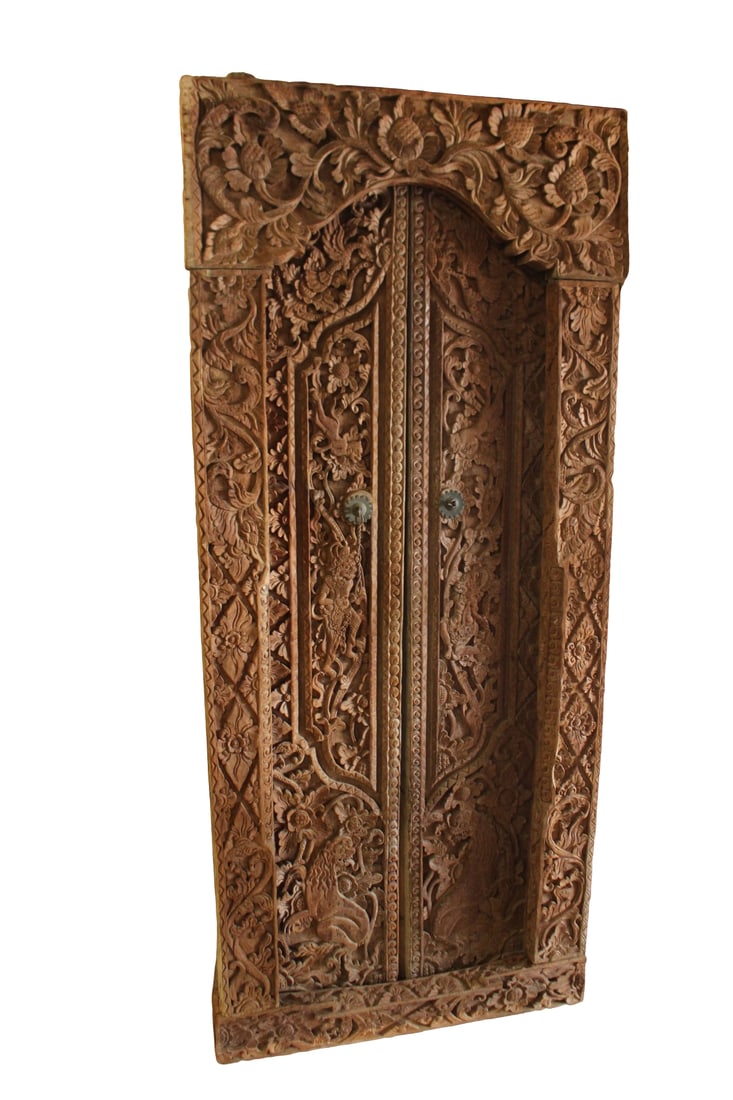 Burmese / Tibetan Heavily Carved Door: Very ornate heavily carved door depicting Monkeys, Foo Dogs & Dancers.The door measures:70 in high. 30.5 wide. 5 in depth