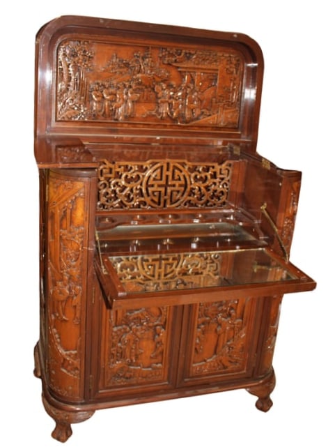 Beautiful Carved Japanese Liquor Cabinet: Very ornately carved Japanese Liquor cabinet. Opens to a full bar. Measurements: 42.5 H x 36L x 18"D