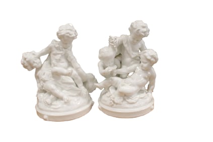 A Pair of Porcelain Cherub Groups