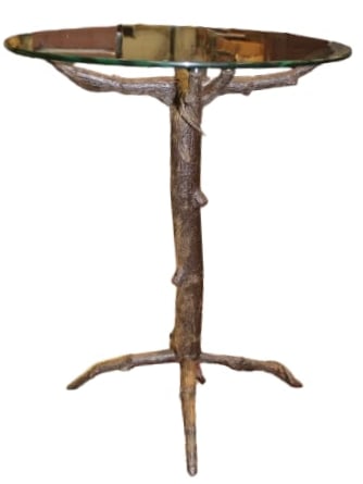 Tree Branch Iron Table in the manner of Giacometti: Nice iron tree branch table in the manner of Giacometti. The measuremnts are30" tall and 25" in diameter.