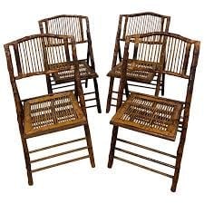 Set of 6 Mid-Century Burnt Bamboo Tortoise Folding Chairs - 4 shown.