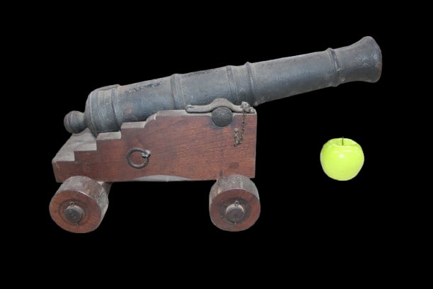 Antique Cast Iron Cannon: Cast Iron Antique Cannon that actually fires. The measurements are 27.75" deep x 11.5" wide x 11" high.