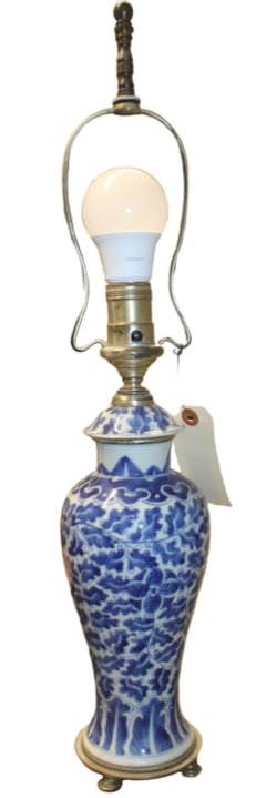 Antique Chinese Vase converted into a lamp: Antique blue and white chinese vase that has been converted into a lamp. The lamp has a repair to the neck. See the phots.