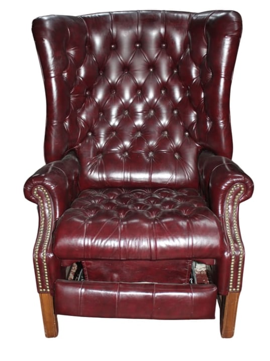 Leather Chesterfield Recliner: Leather Chesterfield Recliner. The measurements are: Height 44" Depth 30" Width 31"