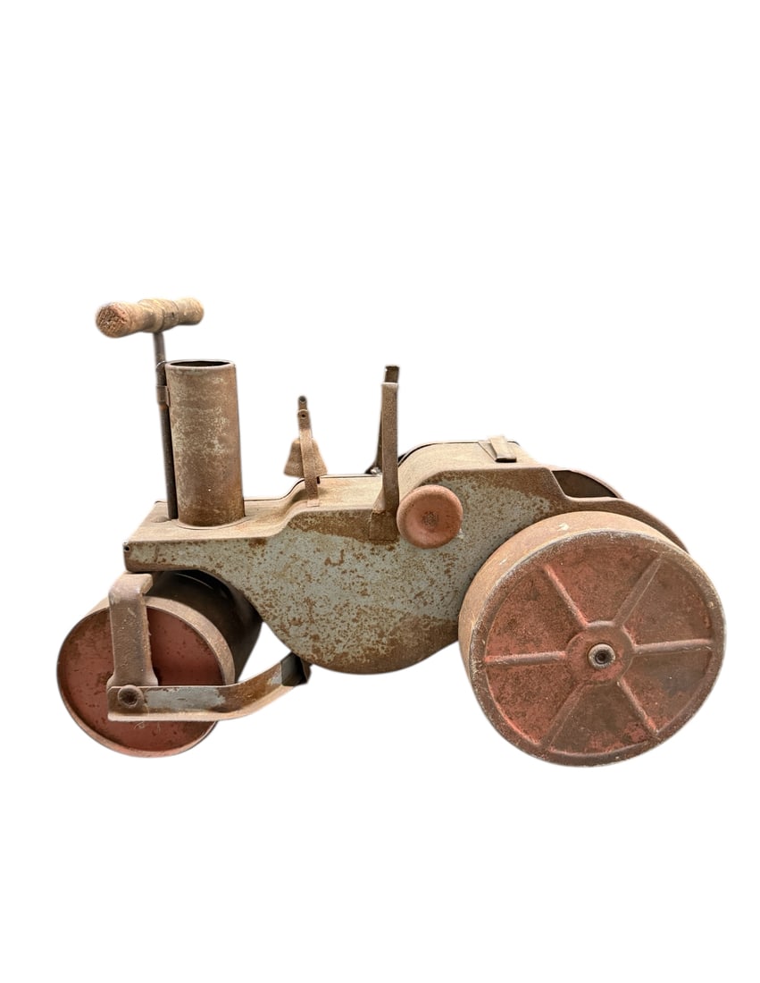 Antique Keystone Steamroller "Ride Em": Keystone "Ride 'Em" Steam Roller from the 1920s or 1930s.It was manufactured by the Keystone Mfg. Co. in Boston, Massachusetts. It is made of pressed steel with wooden handles. Measuring 20 long by 9