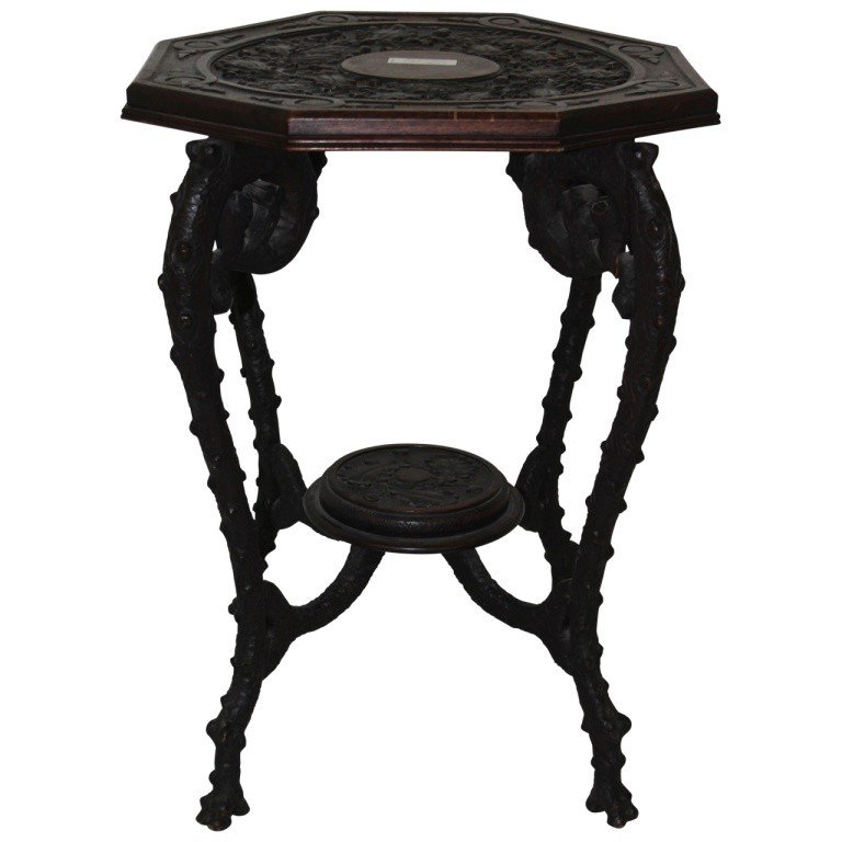 19th C. Finely Carved Black Forest Table: Exceptional 19th c. Black Forest Table finely carved with owls, tree branches, leaves and acorns. Measures 28.5"h x 21.5"diam. Swiss/German. In very good condition with wear consistent with history.