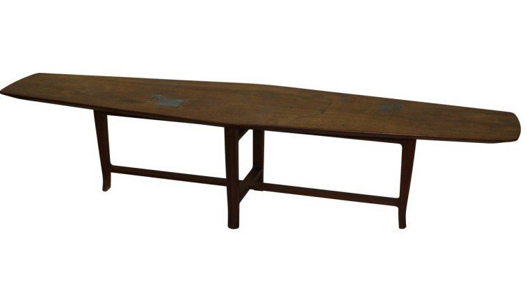 Edward Wormley Coffee Table: Edward Wormley for Dunbar 1957 Janus Collection, this is a stunning walnut MCM coffee table with Tiffany art glass tile inserts in iridescent shades of blueish purple, green and gold. Measures 77" l x