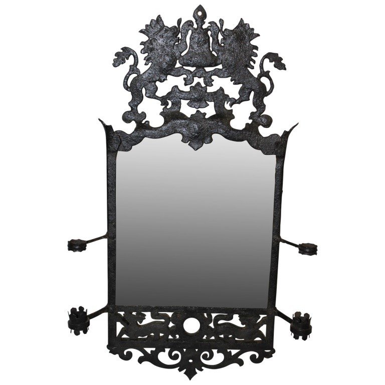 Iron Mirror Sconce: 18th-19th c. English wall and mirror sconce with Coat of Arms. Measures 27"h x 16"w x 3.75"d. In very good condition with wear consistent with history.