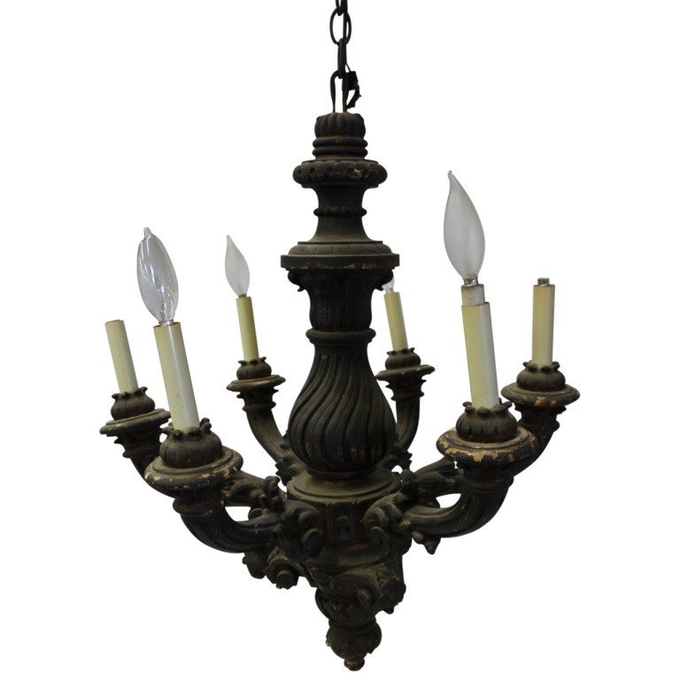 Antique Wooden Chandelier: 19th c. carved Baroque chandelier with 5 light sockets. Measures 27"h x 21" diam. In very good condition with minor flakes and discoloration.