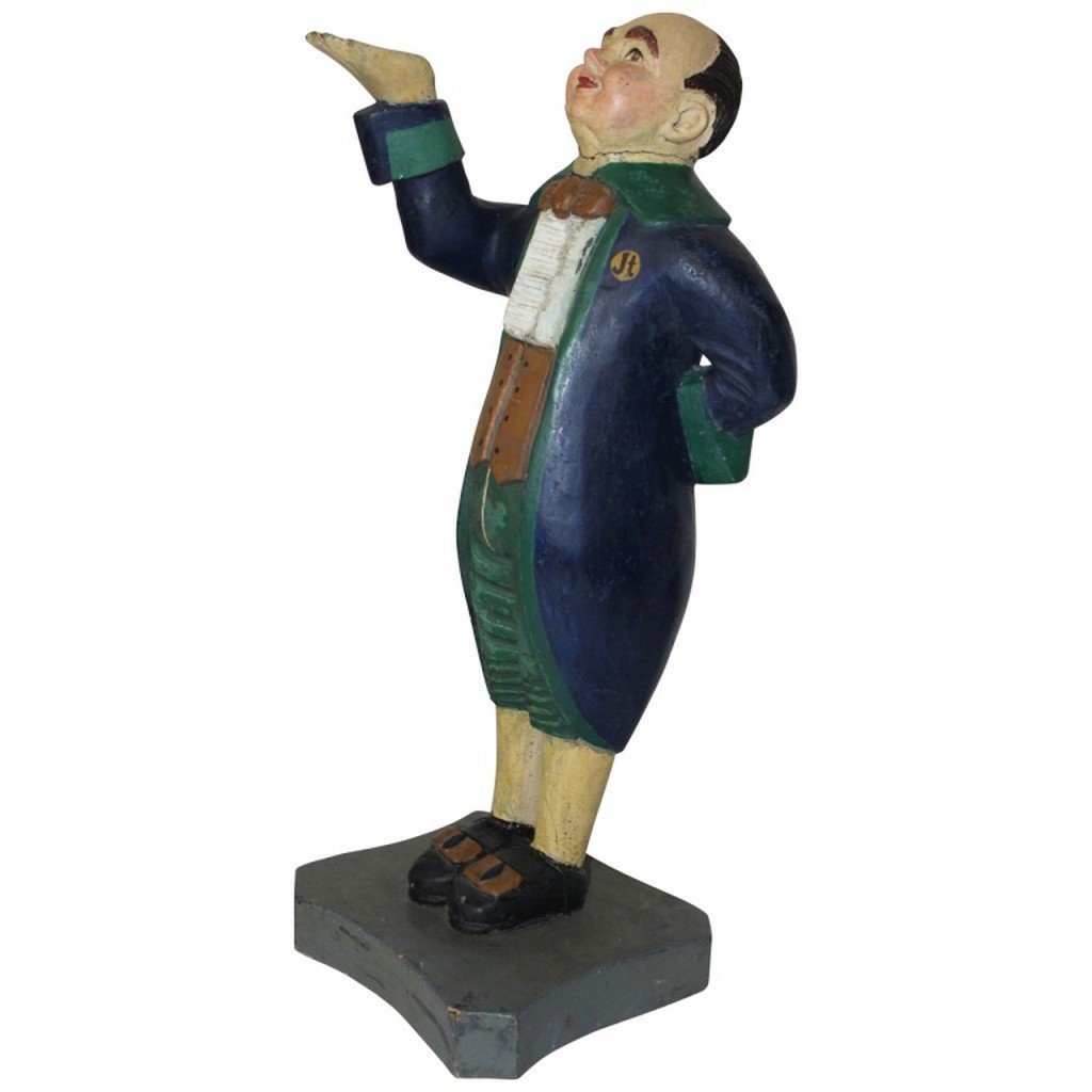 Antique Wood Folk Art Statue: Antique Wood Folk Art Statue Folk Art butler statue with very nice paint. Pine wood. Colors: Blue, green, brown, black, and straw yellow. Circa 1880's. New York or Boston origins. Measures 26" High, 1