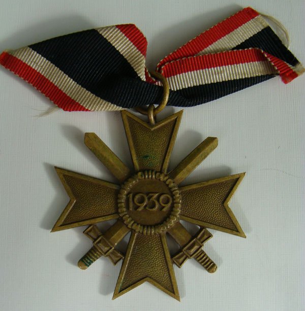 German WW2 War Merit Cross 2nd class: German WW2 War Merit Cross 2nd class. Marked at the ring "11".