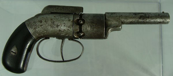 US Pocket Percussion Revolver, Ells Pattern 1854: Josiah Ells 1854 Patent Double Action Percussion Pocket Revolver. Bead sight on barrel, 6-shot unfluted cylinder with scroll engraving and hammer rest. The frame is scroll engraved in a similar patter