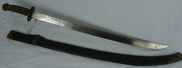 Antique Chinese Sword: Antique Chinese Sword with original ebonized wood scabbard. Length of the blade is 24". Total length is 35 1/2".