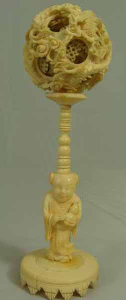 Antique Chinese Curved Ivory Puzzle Bowl: Chinese Carved Ivory Puzzle Ball. Some damage and need repair. height 7 , bowl -diameter 2\. (International shipping IS NOT available on this item. This elephant ivory was imported legally into the Un