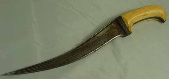 Massive Early 19th Century Persian Dagger Knife Wo: Early 19th Century Fine quality Persian Knife. Unusual Massive Curved Wootz Steel Blade is in good shape with gold inlaying still present. It is much wider toward the grips. Total length is 17\. Lengt