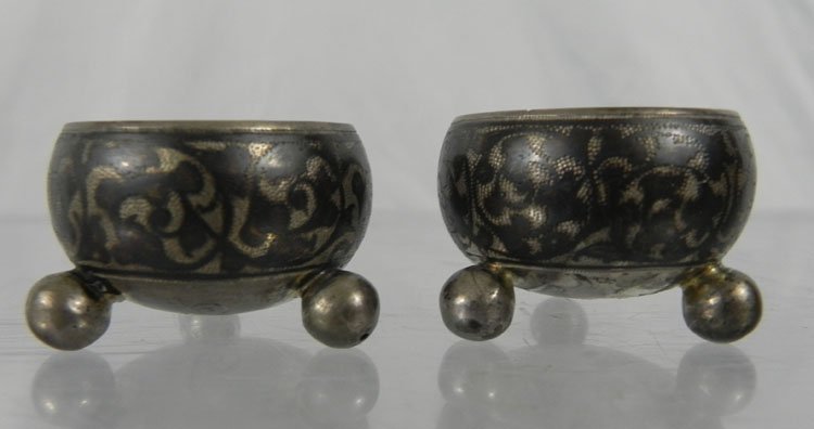 Pair of Antique Russian Sterling Silver Shakers: Pair of Antique Russian Sterling Silver Shakers. Maker Marked and stamped 84. Dimensions: 1,25" tall, diameter 1.1". Weight 40 grams.
