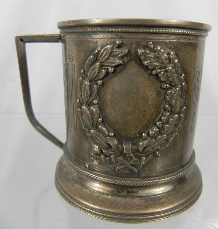 Antique Russian Sterling Tea Cup Holder: Antique Russian Sterling Tea Cup Holder. Written "Na Zdorovje". Maker Marked "BE" and stamped 84. Height 3.5", weight 157 grams.