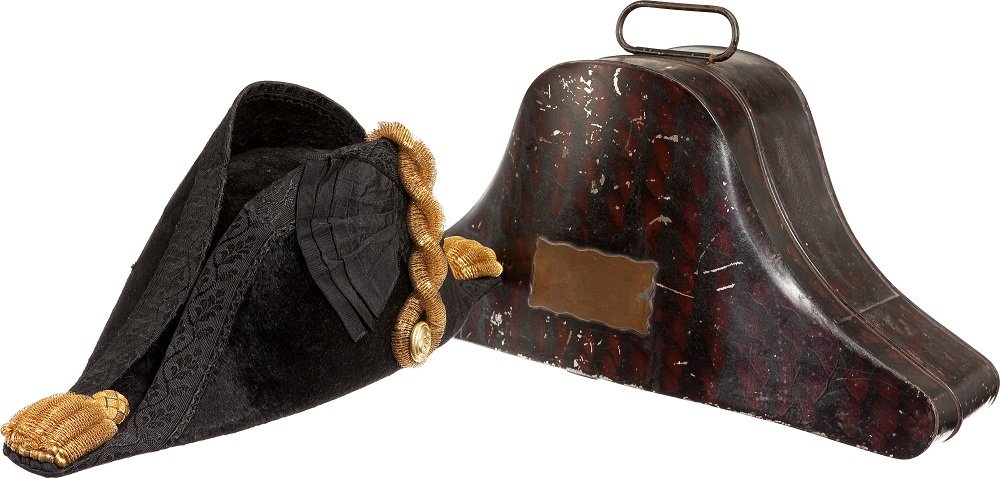 British WWII Royal Navy Officers' Fore-And-Aft Hat: British WWII Royal Navy Officers' Fore-And-Aft Hat and Metal Storage Case. A beautiful example with little or no wear. The hat was manufactured by Alfred Shannon, Devonport and is marked size 7. The b