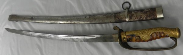 Rare WWII Chinese Military Dress Sword: WWII Chinese Military Dress Sword. Blade with some light tarnishing. Steel scabbard with some dark spots. Total length is 36.5". Length of the blade 25.75". Rare.