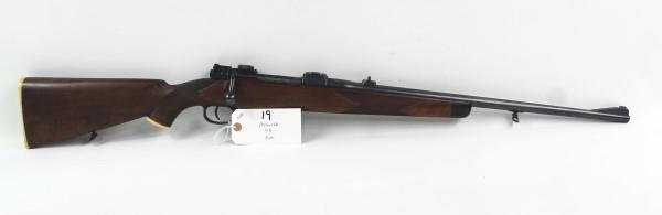 MAUSER 8MM RIFLE: MFR - MAUSER MODEL - 98 SERIAL - 8402 ACTION - BOLT ACTION RIFLE CALIBER/GAUGE - 8 MM ALL MATCHING NUMBERS - CLAW SCOPE MOUNT - APPEARS TO HAVE SOMEONES SSN SCRATCHED ONTO THE BARREL Manufacturer: MAU