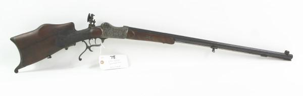 OTTO BOSSEL SCHUETZEN RIFLE: MFR - OTTO BOSSEL MODEL - SCHUETZEN SERIAL - NVSN ACTION - TRAP DOOR CALIBER/GAUGE - 8.15MM X 46R SUHL - CROWN/B, U PROOF MARKS - 29" OCTAGONAL BARREL - REAR DIOPTER SIGHT - HEAVILY ENGRAVED - DOUBLE 
