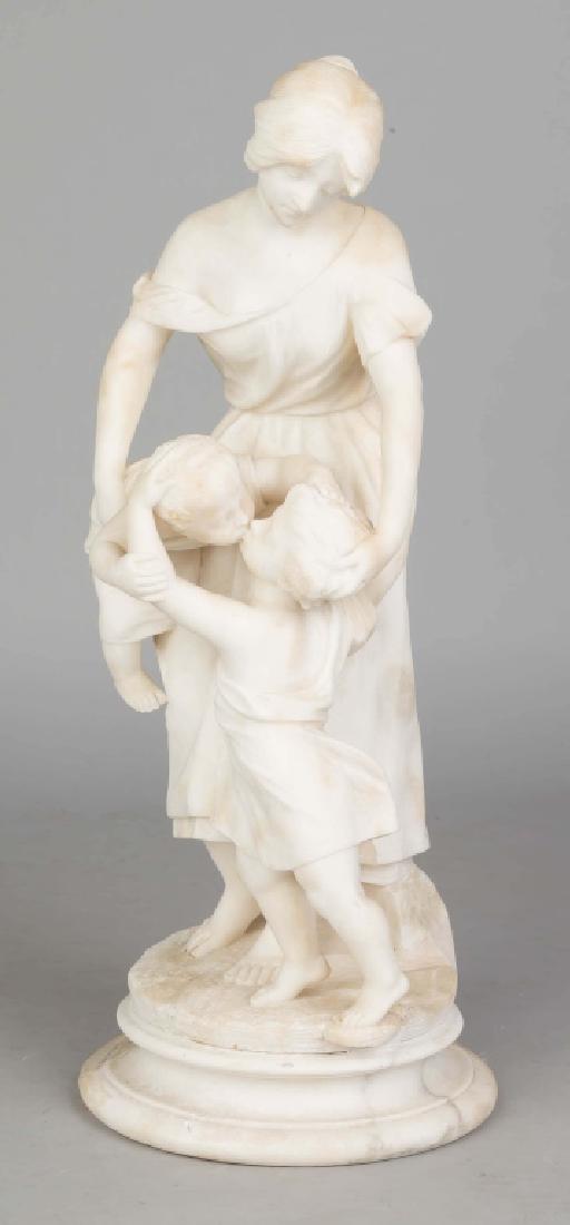 Alabaster Sculpture of A Mother and Two Children: Alabaster Sculpture of A Mother and Two Children. 19th century. Ht. 23".An Old Westbury, NY Collection.
