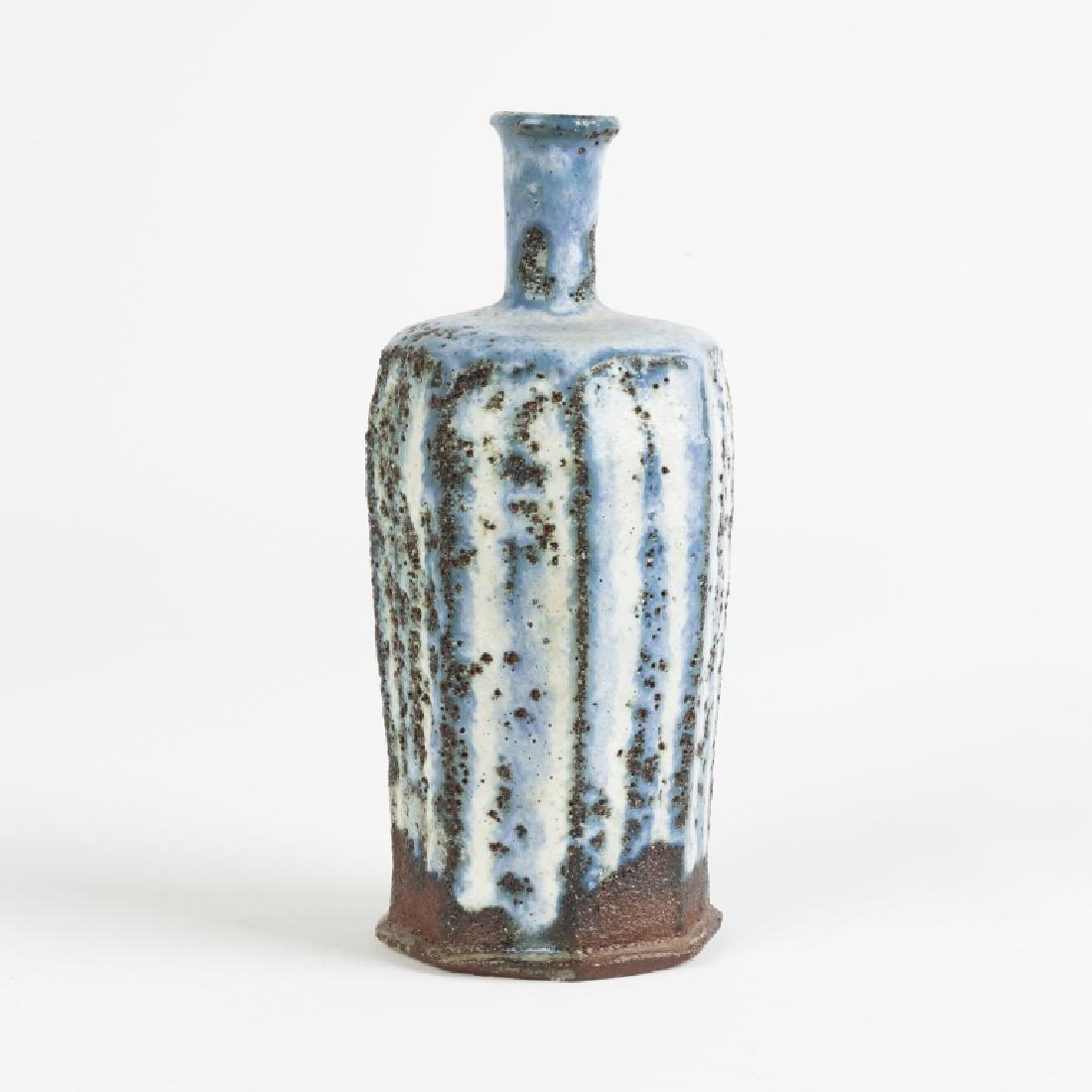 Ulla Hansen (Denmark, B. 1953) Clay Bottle, Faceted,: Ulla Hansen (Denmark, B. 1953) Clay Bottle, Faceted, Blue And White Stripes. c. 1994. Ht. 7 1/2". Anita Besson Gallery, London. Estate of Annette McGuire Cravens, Buffalo, NY.