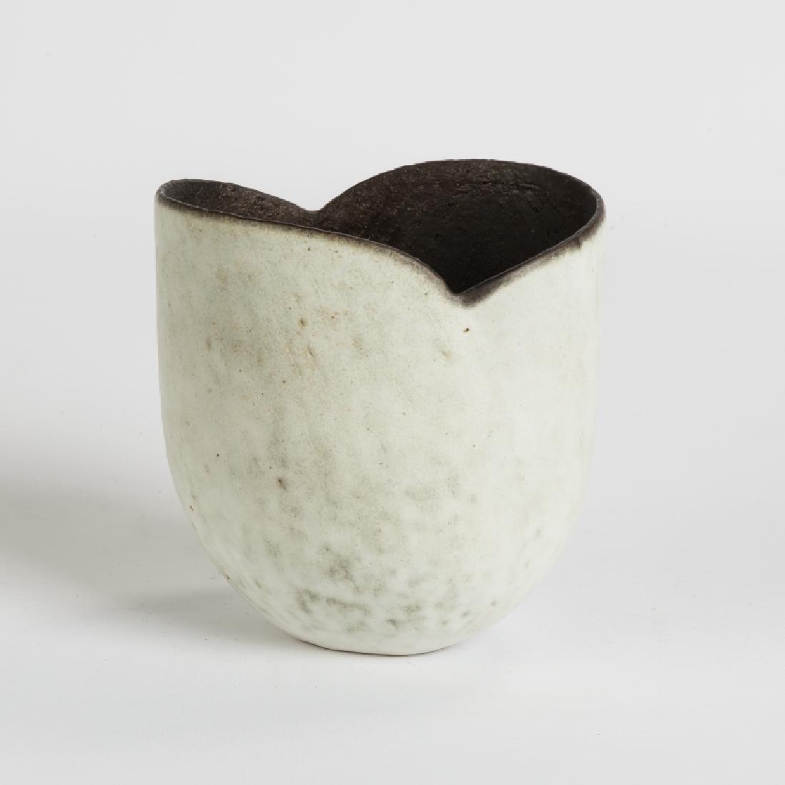 John Ward (English, born 1938) White Oval Pot with: John Ward (English, born 1938) White Oval Pot with Black Interior. Signed. Ht. 5" Dia. 4 3/4". Graham Gallery. Estate of Annette McGuire Cravens, Buffalo, NY.