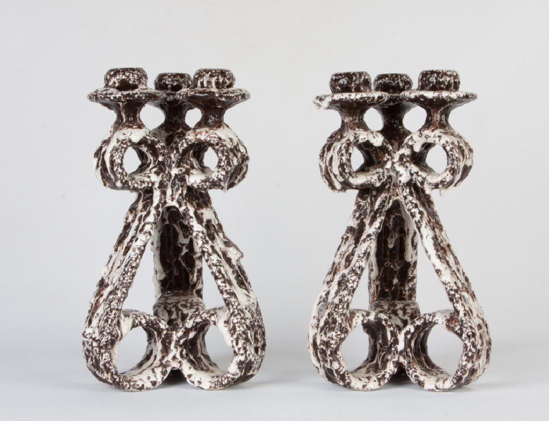 Pair of Lava Glaze Ceramic Vallauris Candelabras by: Pair of Lava Glaze Ceramic Vallauris Candelabras by Marius Giuge. France. c. 1960. Ht. 14".