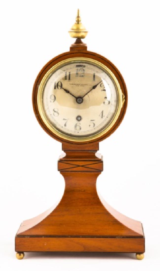Chelsea Clock Co., Boston, MA, Balloon Clock: Mahogany with ebony inlay case. Theodore Starr, Inc., New York, engraved on dial. Ht. 13".