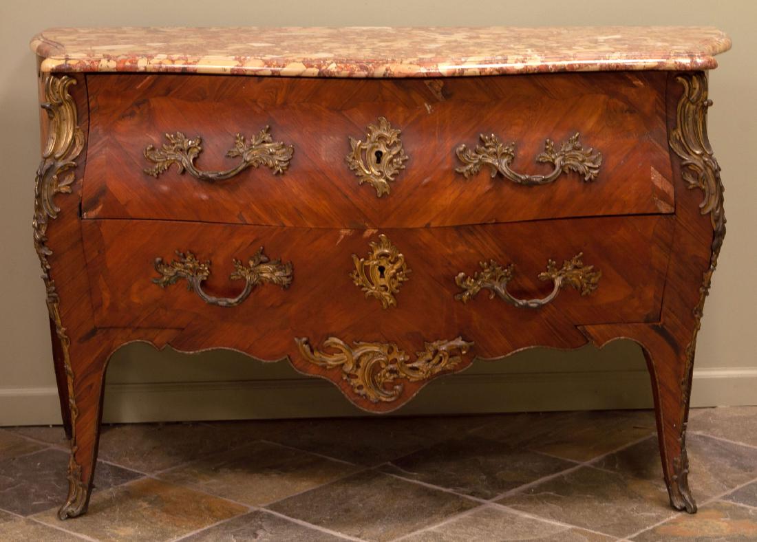Nicolas Petit (1732-1791) Kingwood Bombé Commode: 18th century. Paris, Louis XV period. Stamped “N·PETIT” and “JME” with gilt bronze mounts and "Brèche de Médous" fossilized marble top . Ht. 33 1/2" W 55" D 25". The Strong-Wadsworth Collec
