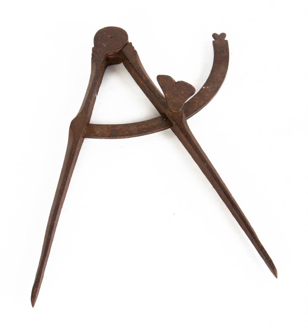 W & C Wynn Cast Iron Compass Caliper: W & C Wynn Cast Iron Compass Caliper 19th century, with heart decoration. L 11 1/4". Dr. Zemenick Collection.
