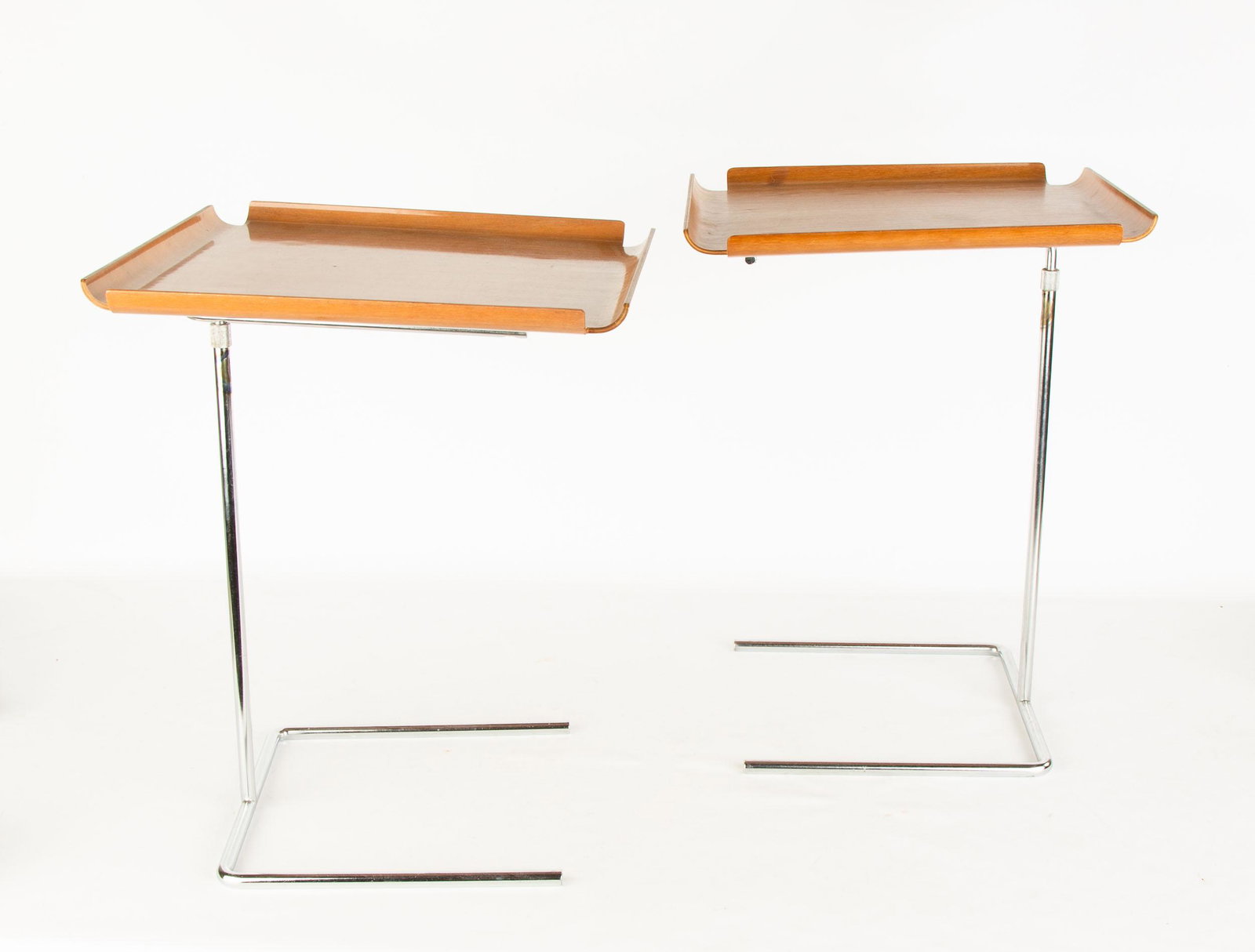 George Nelson & Associates Tray Tables, Model 4950: George Nelson & Associates Tray Tables, Model 4950 Herman Miller, USA, circa 1949. Walnut, plywood, chrome-plated steel. Ht. 20 1/4" W 15 1/4" D 15 1/4" The Lorraine & Sy Merrall Collection, Rochester